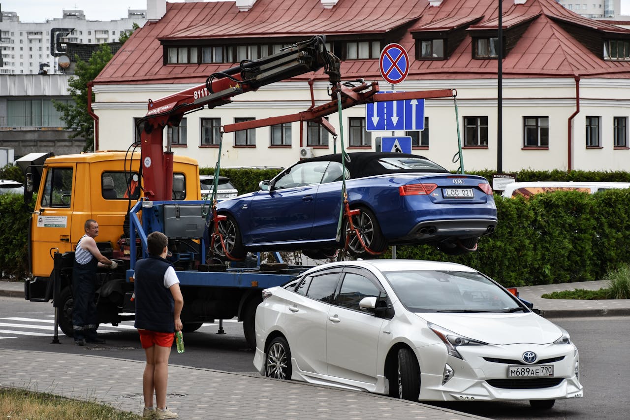 a-car-being-towed-away-13151224